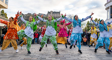 Dance group celebrates Indian festival Diwali in Edinburgh, Scotland.