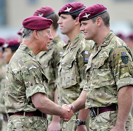 The Prince of Wales talks to members of the Parachute Regiment at their barracks in Colchester as he presents them with Afghanistan campaign medals.