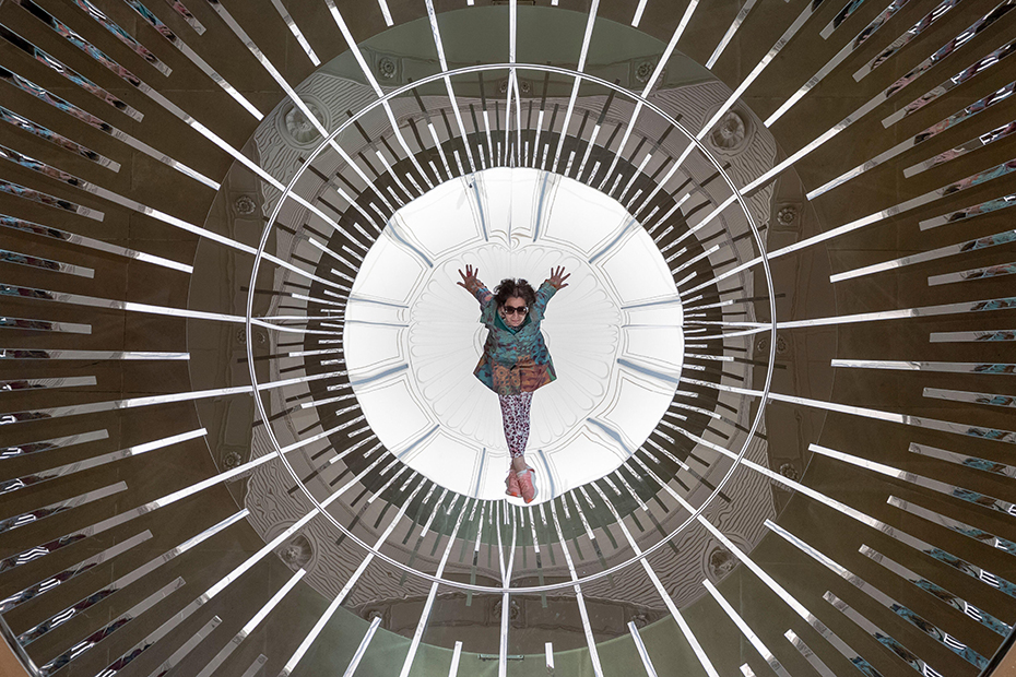 A staff member poses for an aerial view at the unveiling of ‘The Living Room: Alchemy’, by artist and designer Melek Zeynep Bulut.