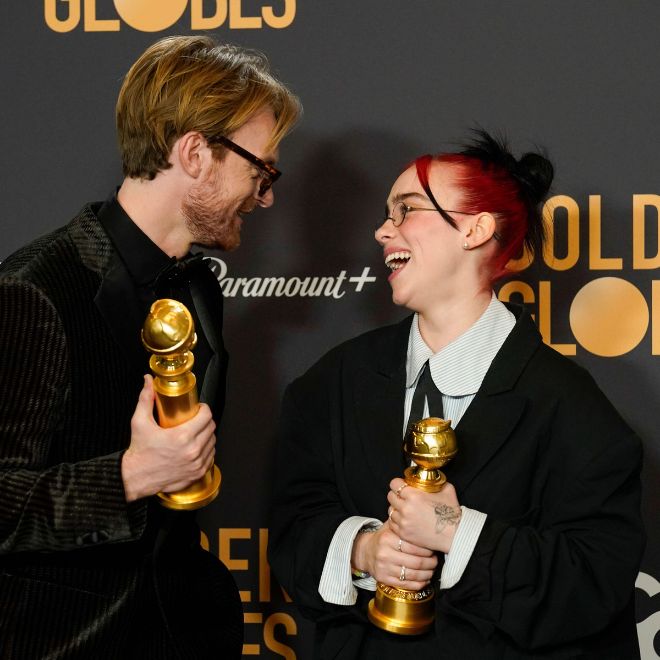 Finneas, left, and Billie Eilish pose in the press room with the award for best original song, motion picture for "What Was I Made For?" from "Barbie"