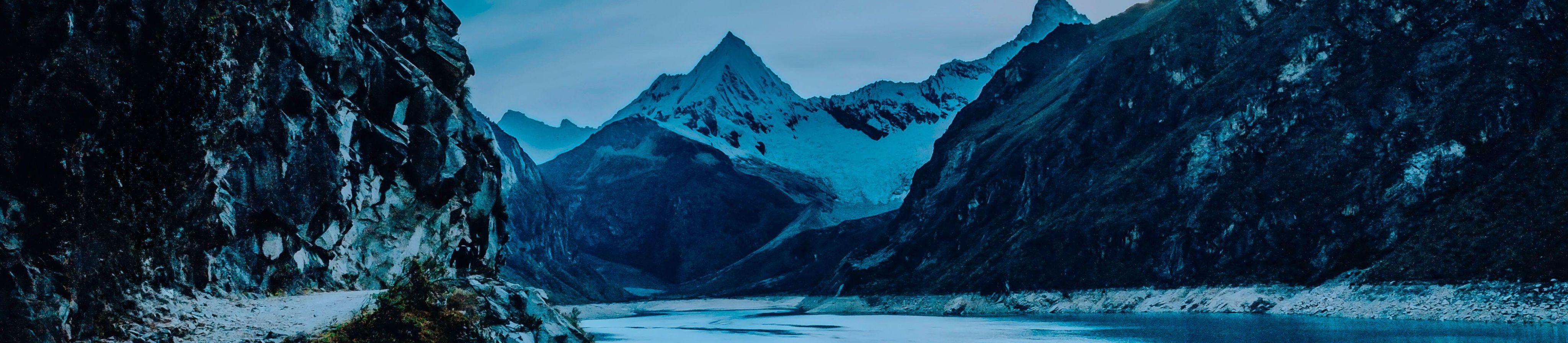 Snow-capped mountain and lagoon on blue background - Image ID: 2T5NY5M (RF)