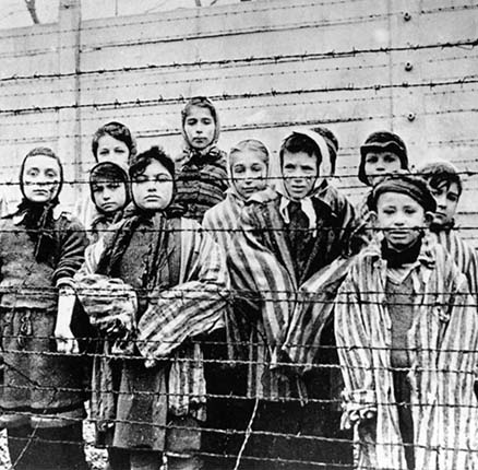 AUSCHWITZ CONCENTRATION CAMP Still from Soviet Army film of women and children still in shock after the Red Army liberation in January 1945