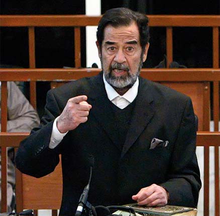 Ousted Iraqi leader Saddam Hussein addresses the court during his trial in Baghdad's heavily fortified Green Zone October 11, 2006.
