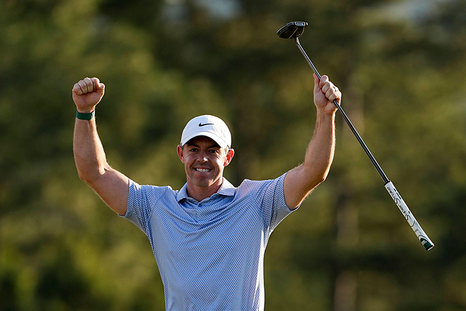 Rory McIlroy, of Northern Ireland, celebrates after winning the Masters golf tournament at the Augusta National Golf Club