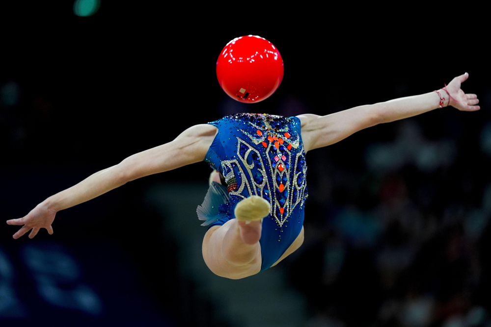 Stiliana Nikolova, of Bulgaria performs in the rhythmic gymnastics individuals all-round qualification round, at La Chapelle Arena at the 2024 Summer Olympics, Thursday, Aug. 8, 2024, in Paris, France