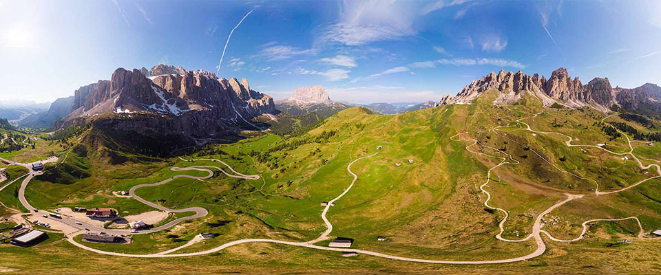 Dolomites - Beautiful panoramic sunset landscape at Gardena Pass, Passo Giau, near Ortisei. Stunning airial view on the top Dolomiti Alps Mountains from drone on summer day, Italy, south Tyrol, Europe