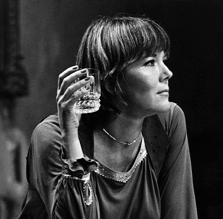 Diana Rigg in NIGHT AND DAY by Tom Stoppard directed by Peter Wood at the Phoenix Theatre, London in 1978. Dame Enid Diana Elizabeth Rigg, born Doncaster 1938. English stage, film and television actress. Made a CBE in 1988 and a DBE in 1994.