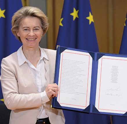 European Commission President Ursula von der Leyen shows signed Brexit trade agreement due to come into force on January 1, 2021, in Brussels, Belgium