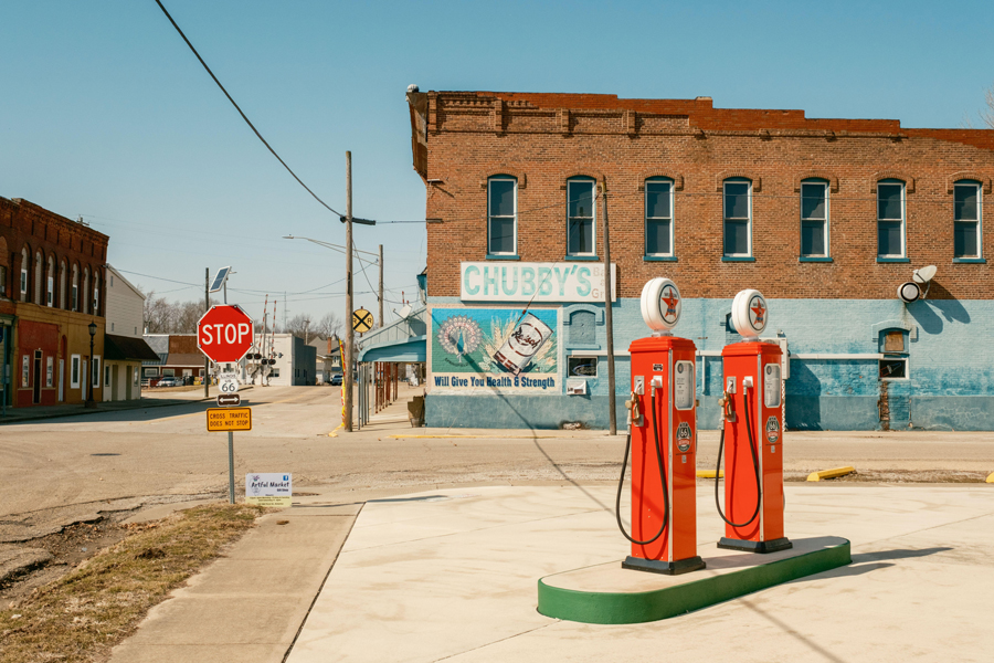 Vintage gas pumps at the American Giants Museum and view of downtown Atlanta, Illinois on Route 66