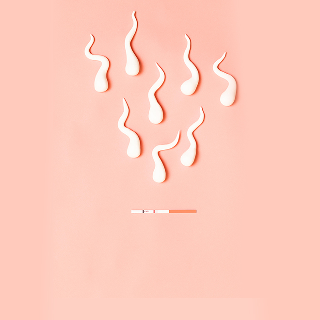 Figures of sperm and pregnancy test on living coral background. Medical concept.