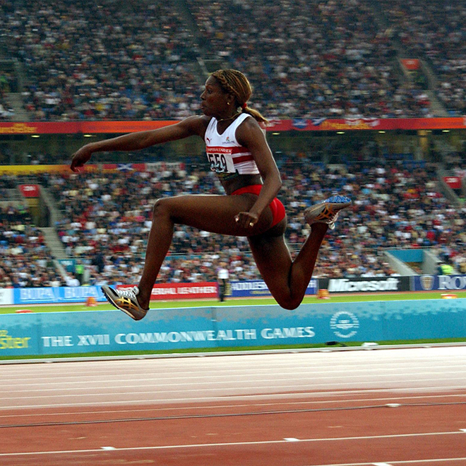 GADPH7 - England's Ashia Hansen leaps 14.86 to win the Gold Medal with her last jump