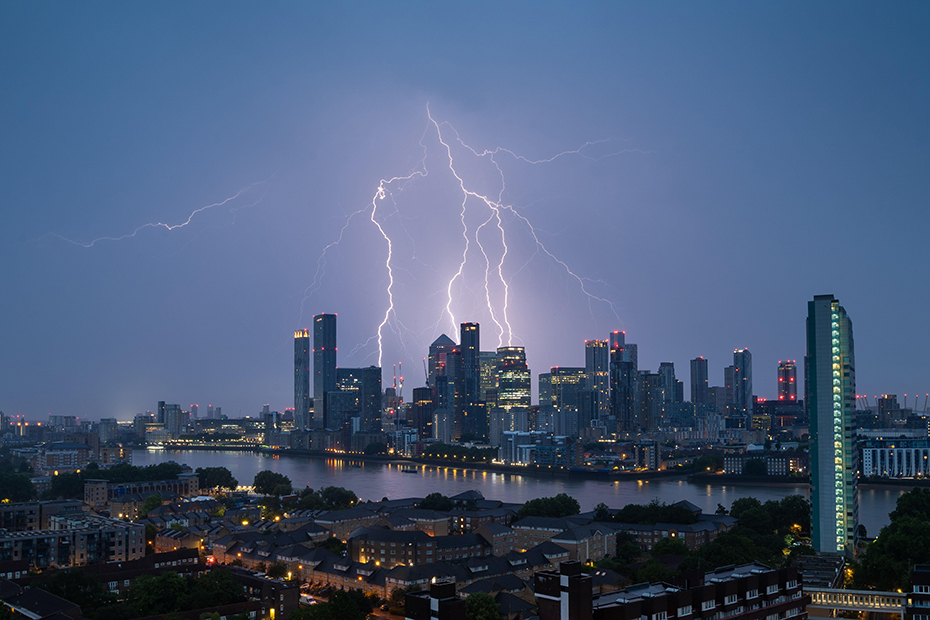 Lightning strikes over the city hitting Canary Wharf business district buildings at 04:33 on Saturday morning. 