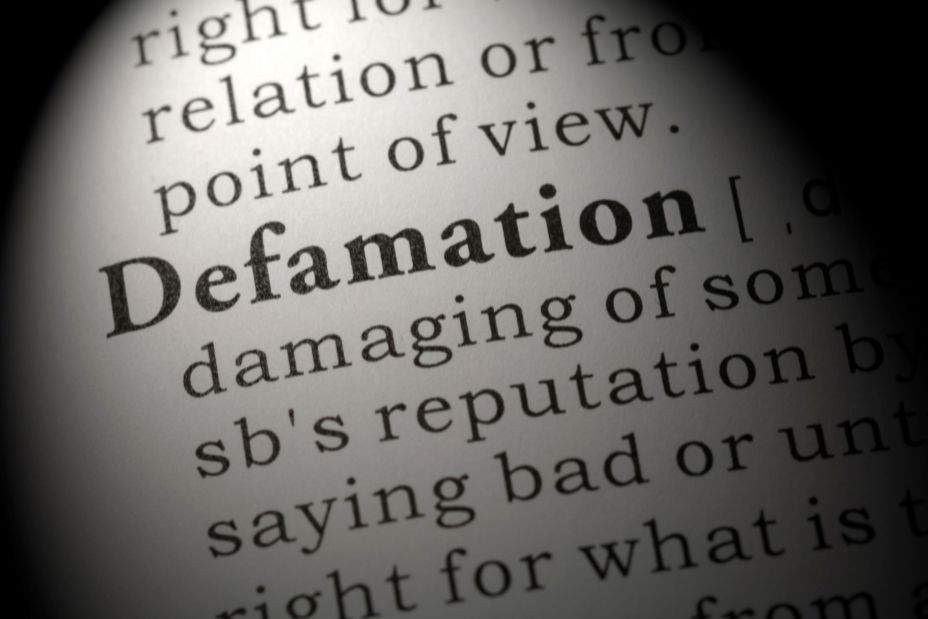 Fake Dictionary, Dictionary definition of word defamation. - Image ID: 2C47DMA (RF)