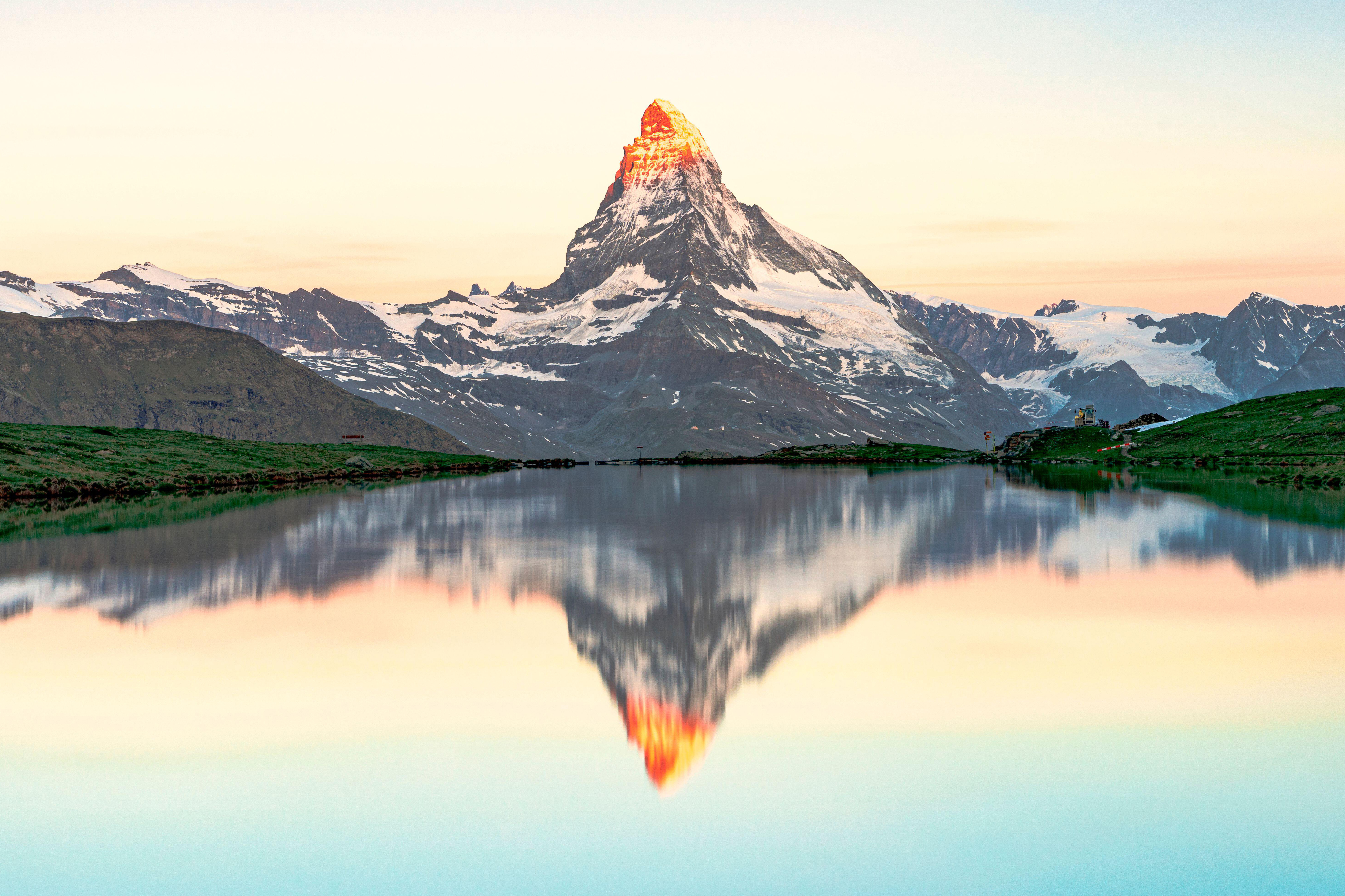 Matterhorn reflected in lake Stellisee at dawn, Zermatt