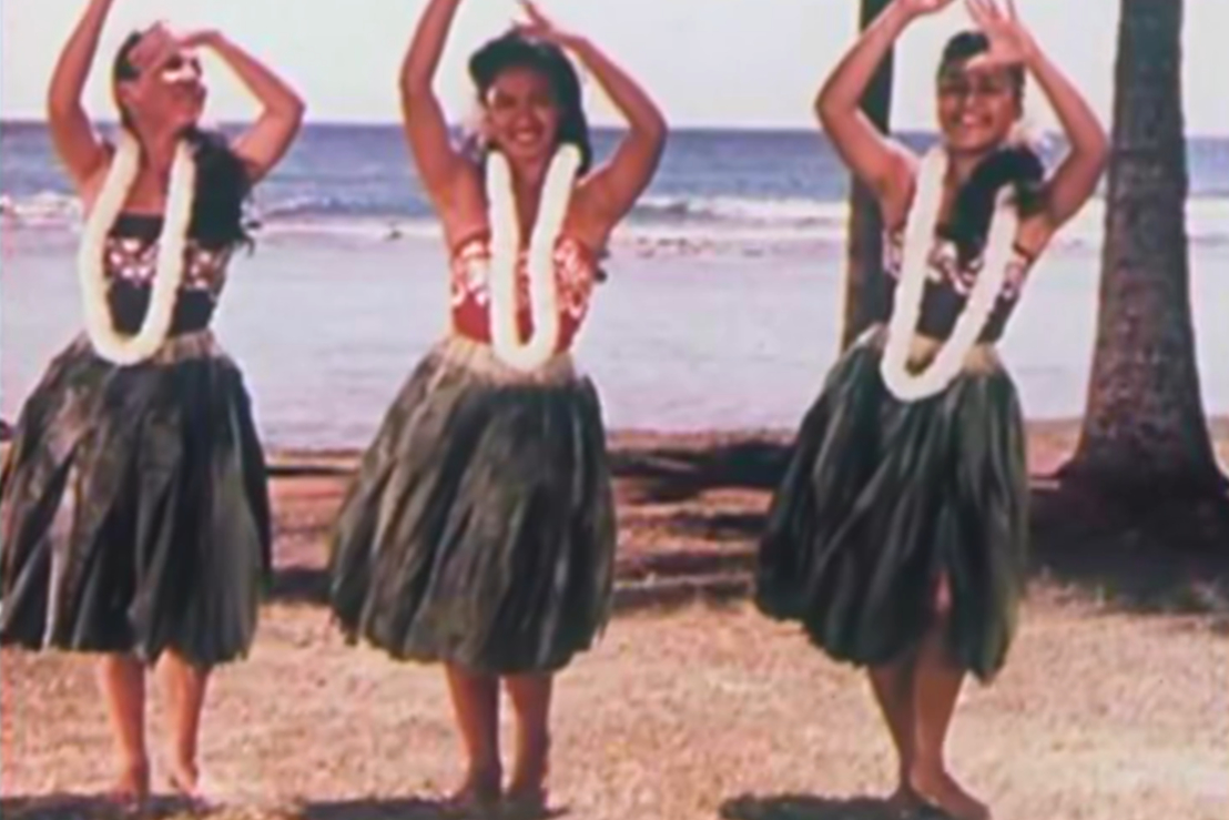 Three Hawaiian women dancing