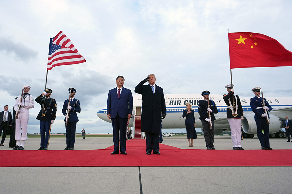 President Donald Trump salutes during a military flyover during an arrival ceremony with China's President Xi Jinping at Joint Base Andrews.