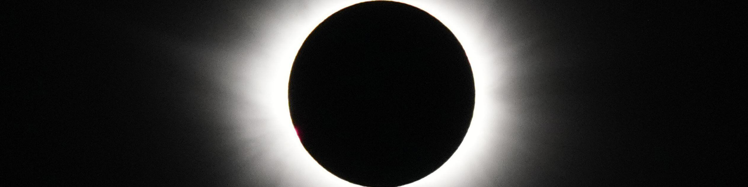 A view of the total eclipse, as the Moon passes between the Earth and the Sun, as seen from on board the Ambassador cruise ship Ambition, off the coast of Greenland.