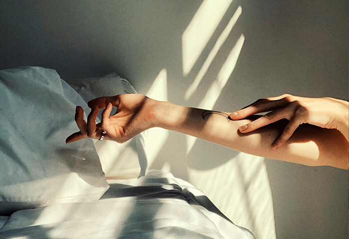Hands in the morning light