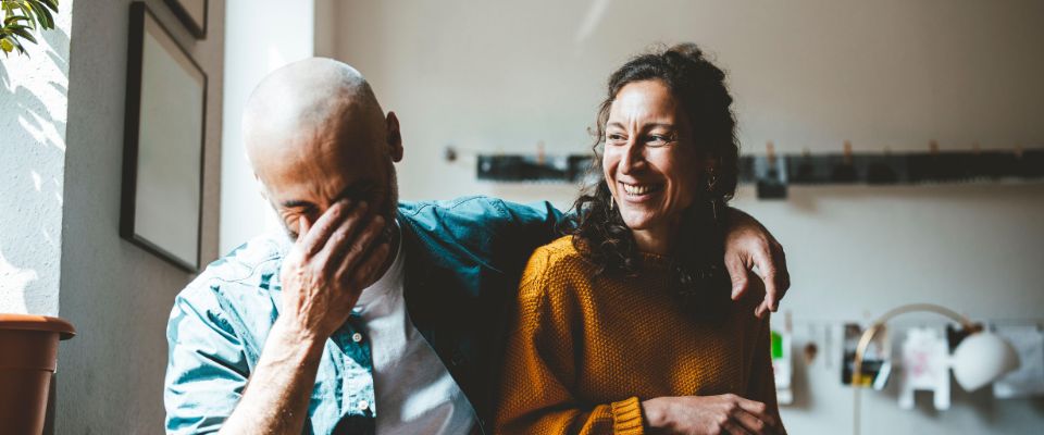 Happy couple enjoying together at home - Image ID: 2R920AB (RF)