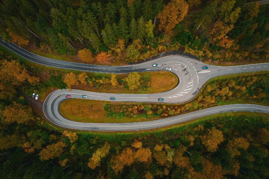 S-bend in the deep autumn forest, Hirsau, Calw, Black Forest, Germany - Image ID: 2T5YPCT (RF)