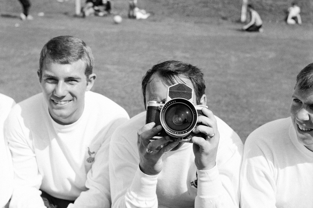 Tottenham Hotspur's Jimmy Greaves plays about with a camera.