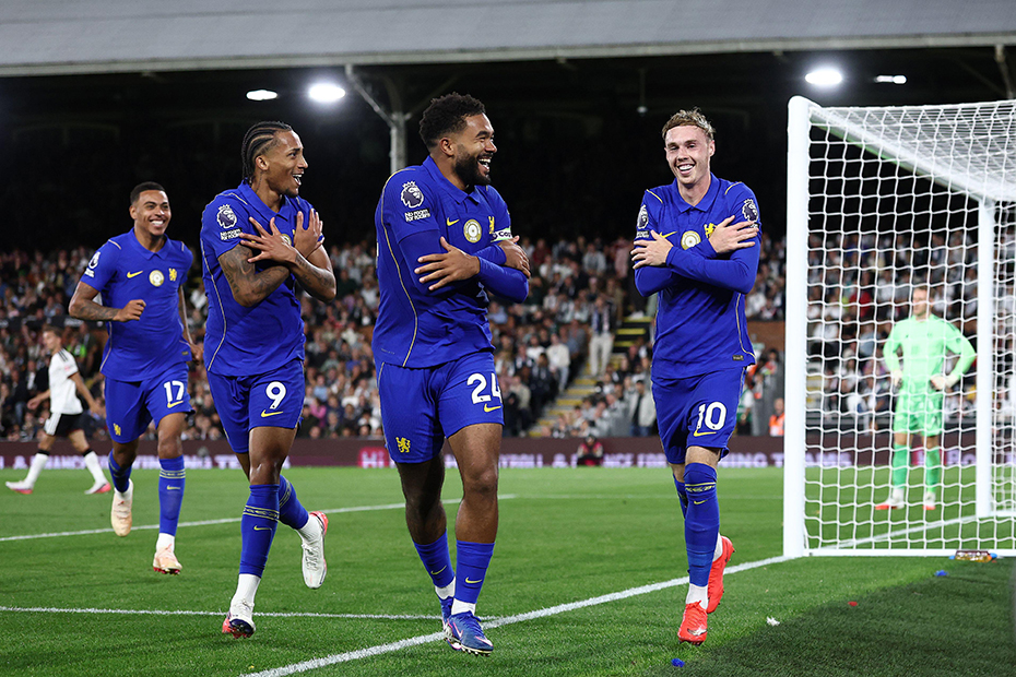 Chelsea’s Cole Palmer celebrates with Joao Pedro and Reece James after scoring to make it 3-1 during the Premier League match at Craven Cottage, London.