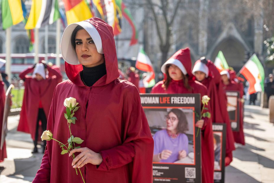 London / UK. International Women Day was marked by demostrators dressed in 'The Handmaid's Tale' costumes to highlight the oppression of women in Iran. 