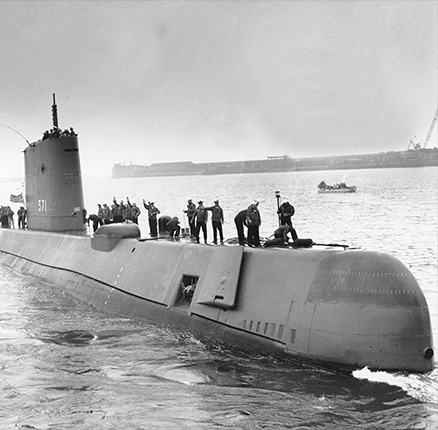 The U.S. Navy's nuclear-powered submarine USS Nautilus leaves for home at Portland, Dorset on Aug. 18, 1958.