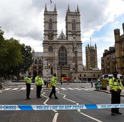 Police cordon near Westminster Abbey following a man driving a car and crashing into security barriers outside the Houses of Parliament in London, UK on August 14, 2018. Several people have been injured.