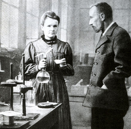 MARIE and PIERRE CURIE in their laboratory about 1905