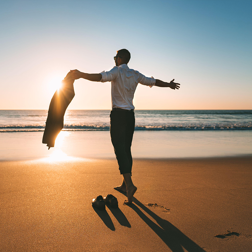 Life is good. Successful man enjoying life and freedom. Work life balance. Day off work concept. Free man with open arms enjoying nature.