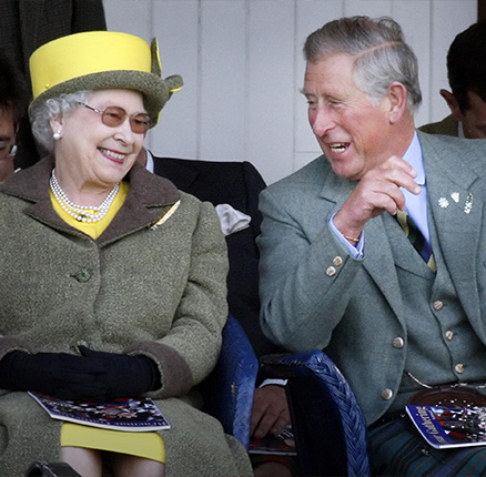 Queen Elizabeth II and the Prince of Wales during the Braemar Gathering Highland Games in Scotland.